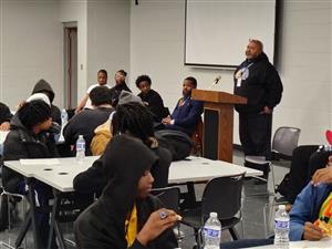 Project Manhood presenter speaking with Randolph young men